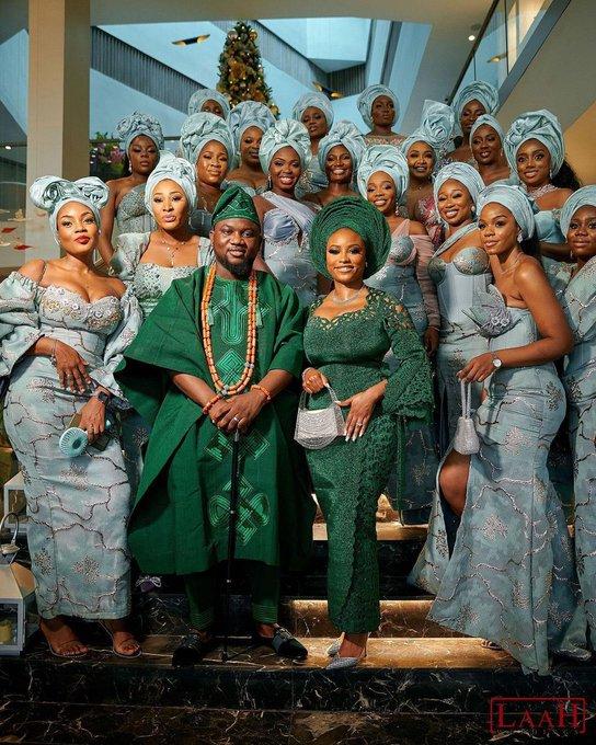 Steel Blue Asoebi Squad at Nigerian Christmas Wedding | Dusty Blue Group Look | OutfitLibrary