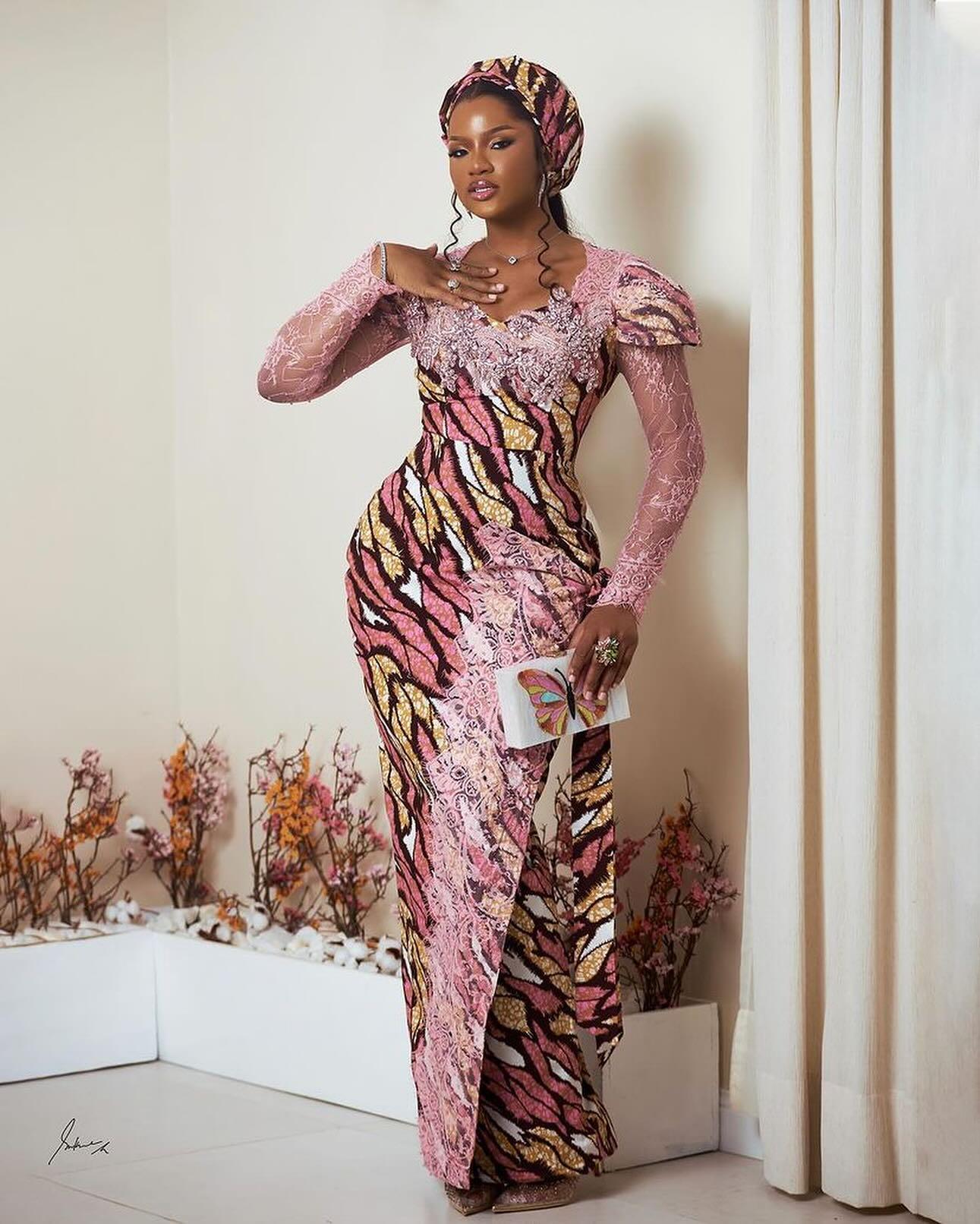 Pink Ankara Tiger Print Asoebi with Lace Overlay Bodice & Butterfly Clutch | OutfitLibrary