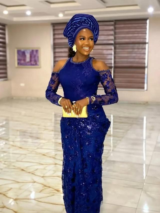 Royal Blue Cold-Shoulder Asoebi in Sequin Lace with Gold Clutch & Matching Gele | OutfitLibrary