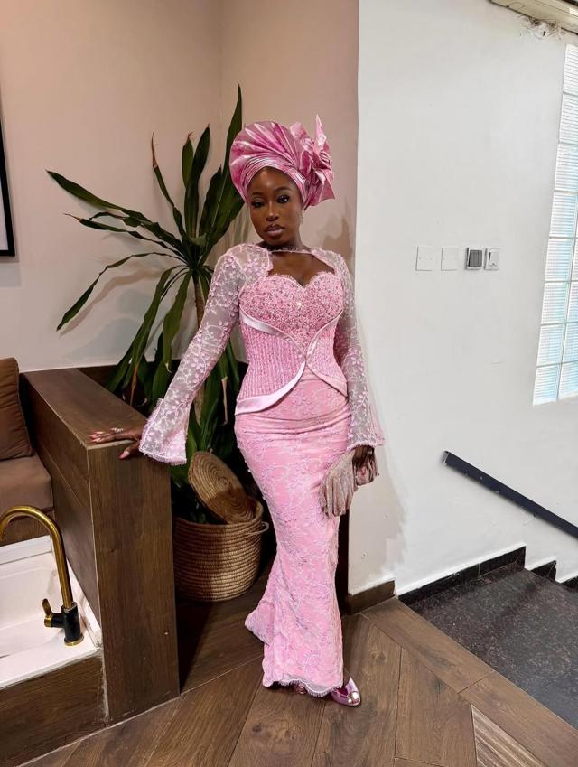 Baby Pink Lace Mermaid Asoebi with Beaded Corset, Lace Sleeves & Glove Clutch | OutfitLibrary