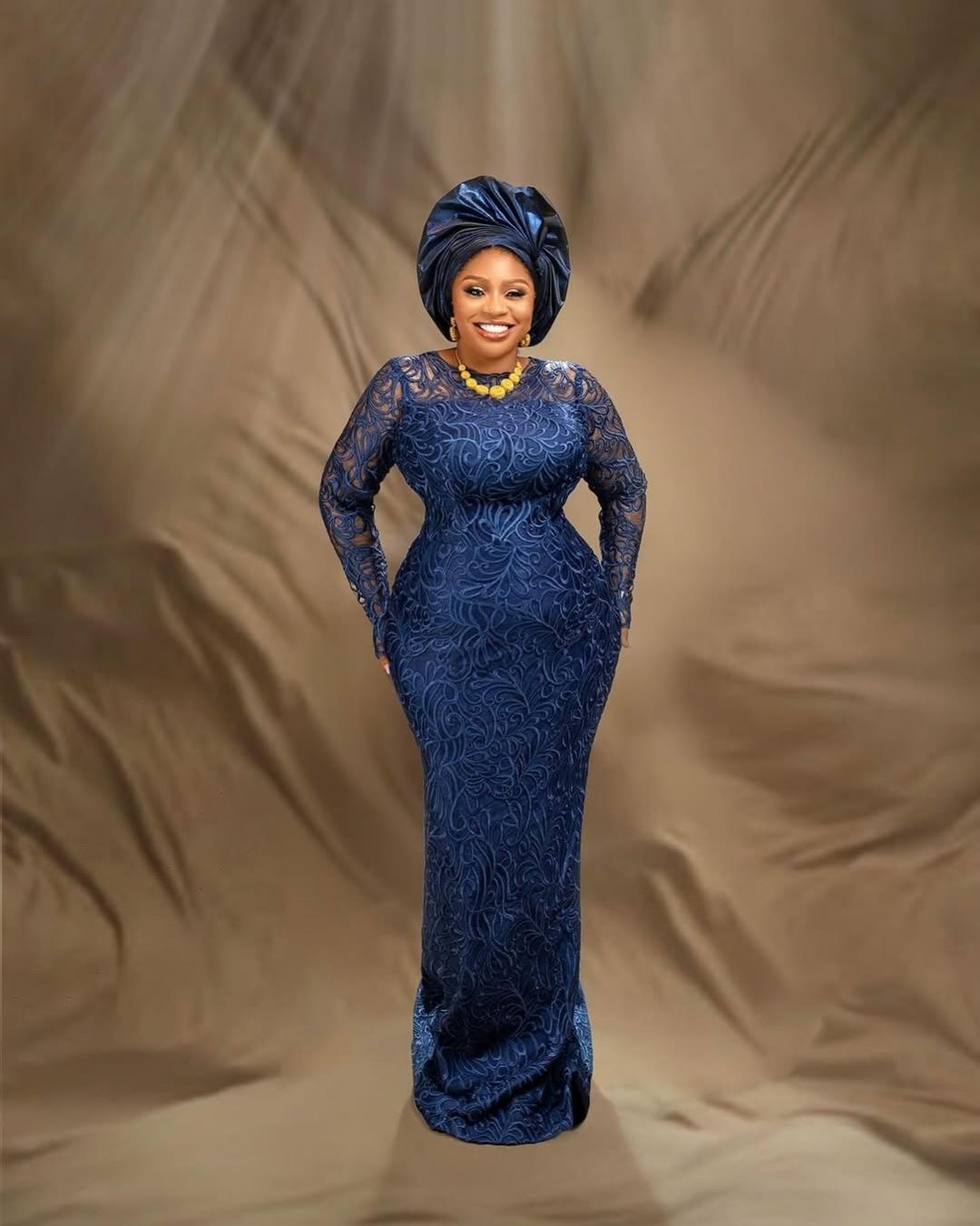 Navy Blue Velvet Scroll Lace Asoebi with Yellow Chunky Bead Necklace & Navy Gele | OutfitLibrary