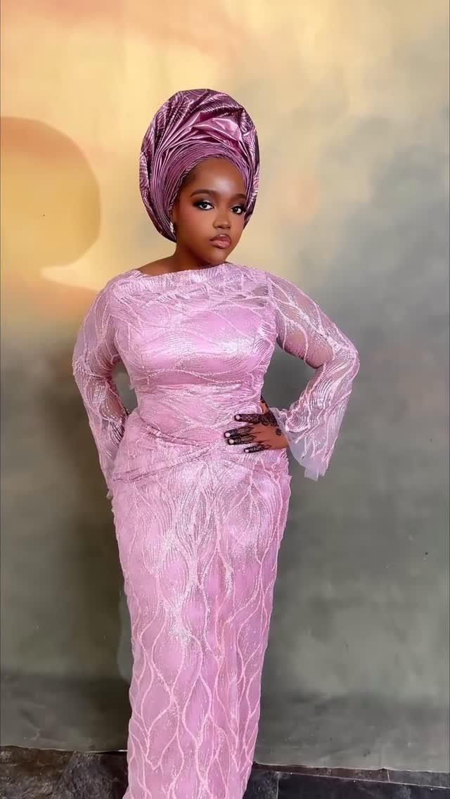Pink Shimmer Wave Lace Asoebi with Mauve Gele & Henna-Decorated Hands | OutfitLibrary