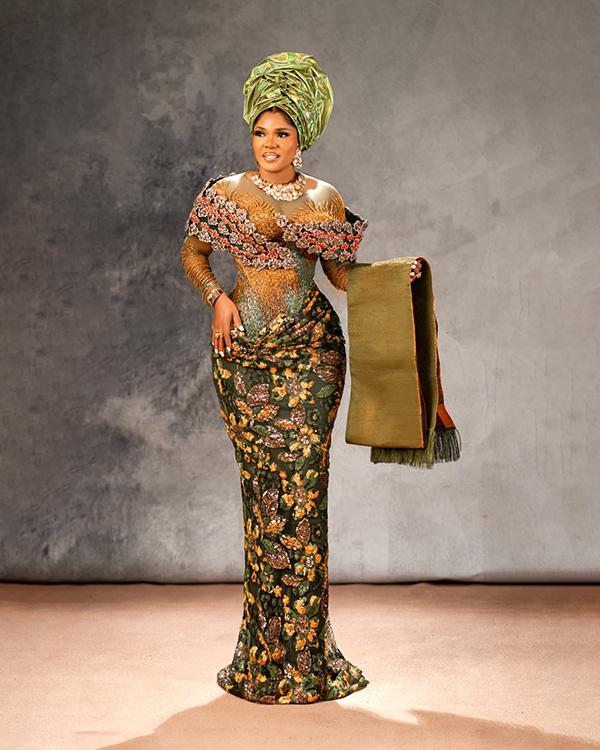 Iyabo Ojo Stuns in Olive Green & Orange Beaded Aso Ebi Gown with Grand Gele | OutfitLibrary.com