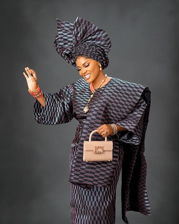 Iyabo Ojo Stuns in Navy & Pink Aso-Oke Buba, Wrapper & Grand Gele | OutfitLibrary.com