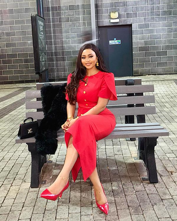 Regina Daniels Brings Elegance in Red Button-Front Dress & Patent Pumps | OutfitLibrary.com