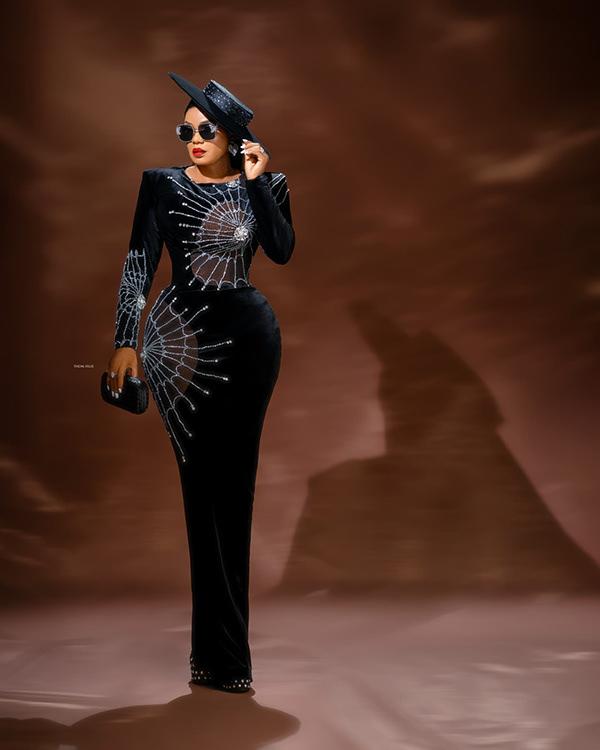 Iyabo Ojo Stuns in Black Velvet Crystal Web Couture Gown with Statement Hat | OutfitLibrary.com