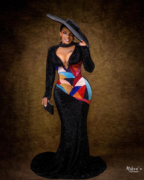Iyabo Ojo Shuts It Down in Black Sequin Mermaid Gown with Multicolour Panel & Oversized Hat | OutfitLibrary.com