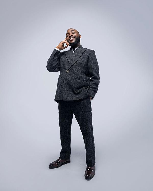 Davido in Charcoal Textured Relaxed Suit & Tie – Effortless Power Dressing | OutfitLibrary.com