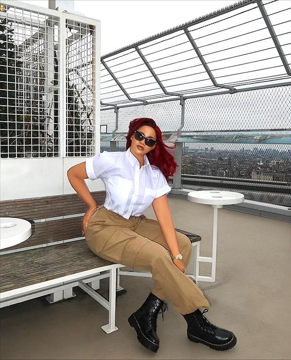 Victoria Uvo Nails Elevated Casual in White Shirt & Khaki Trousers | OutfitLibrary.com