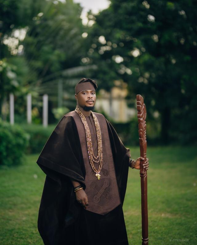 Earthly Majesty: Chocolate Brown Agbada with Bronze Beads & Traditional Staff |OutfitLibrary