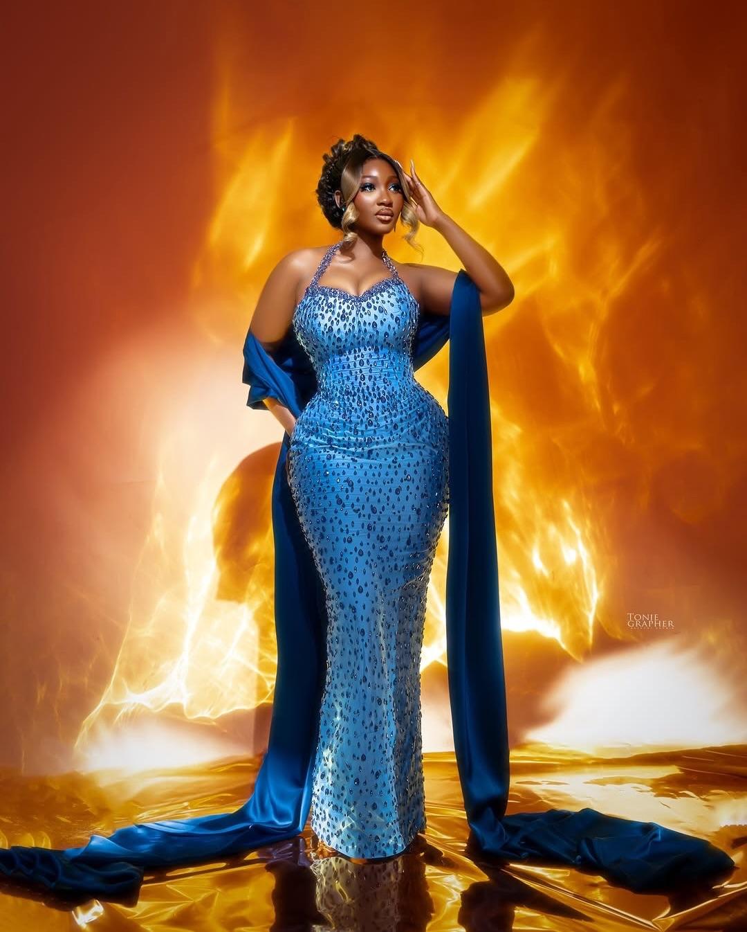 Celestial Sapphire: Teardrop Crystal Gown & Midnight Satin Draping | OutfitLibrary