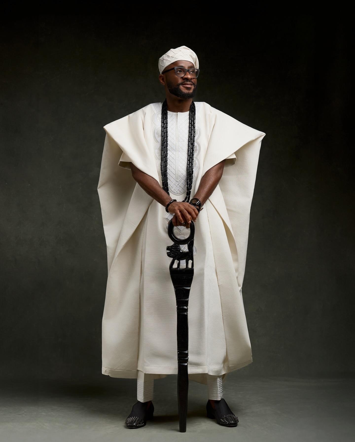 Ivory Authority: Architectural Agbada with Carved Lion Staff | OutfitLibrary
