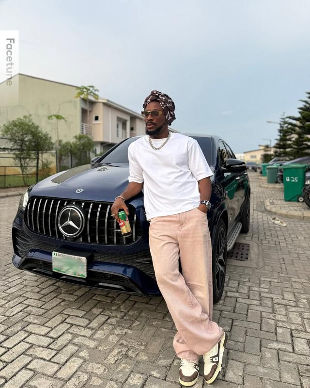 Tobi Bakre Masters Effortless Smart-Casual in Relaxed Neutral Outfit | OutfitLibrary.com