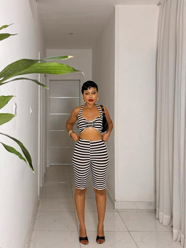 Teniola Aladese Nails Understated Chic Street Style | OutfitLibrary.com